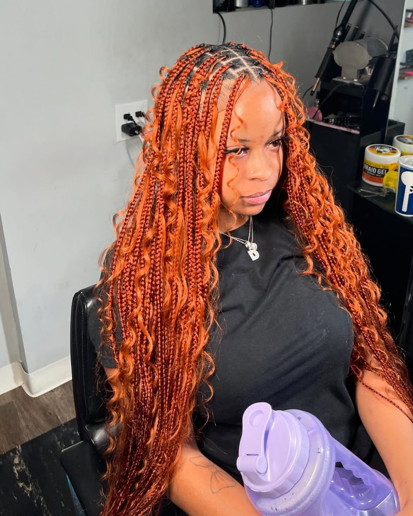 Bohemian box braids with loose curly pieces