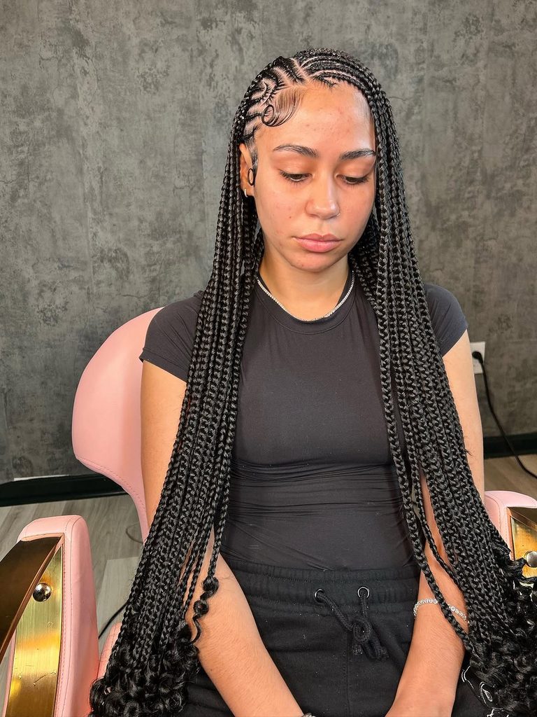 Fulani-inspired braided hairstyle with detailed patterns