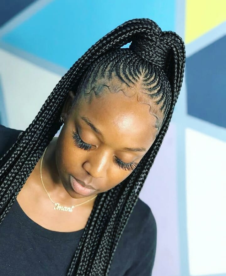 Sleek high braided ponytail with intricate cornrow design and long braids